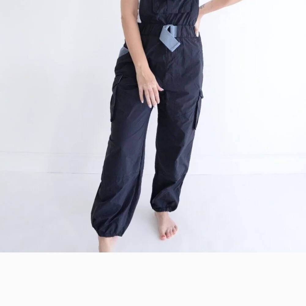 Free People Black Jumpsuit with Relaxed Fit and Tapered Legs